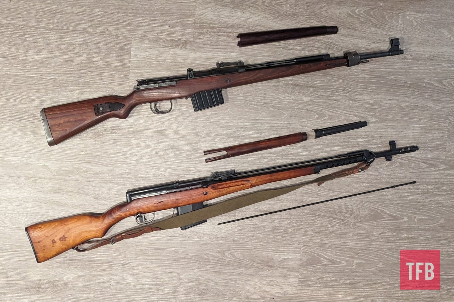 SVT-40 and K.43 partially stripped showing their gas systems.